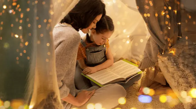 Reading to children in a cosy setting